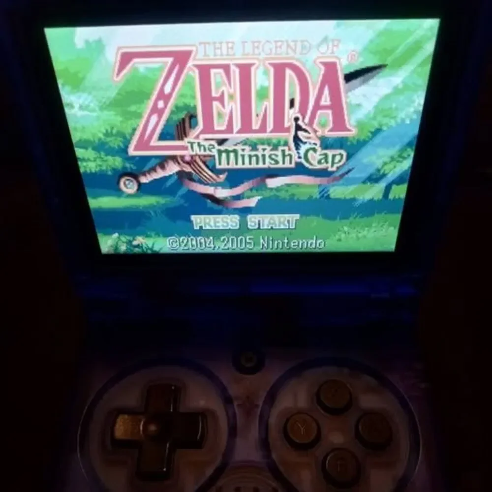 anbernic rg35xxsp blue transparent loaded with most retro platforms 256gb silic